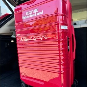 Beis red “text me when you land” check in medium luggage